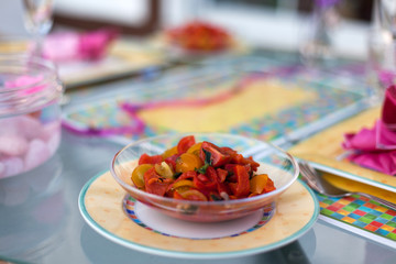 Sommer salad with fresh red tomatos paprika and basil