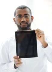 African man holding tablet ready for your message