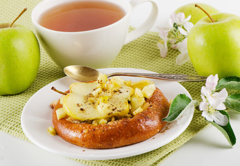 Apple cakes with  tea cup