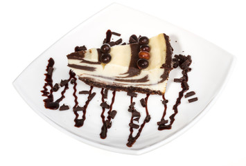 cheesecake with chocolate sauce.