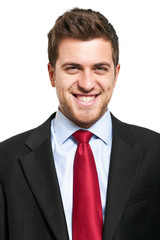 Handsome young businessman portrait isolated on white