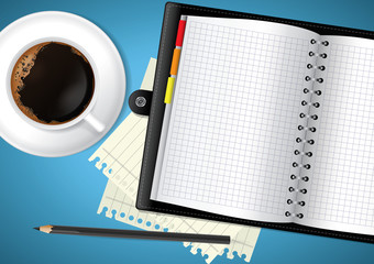 Diary and coffee on table