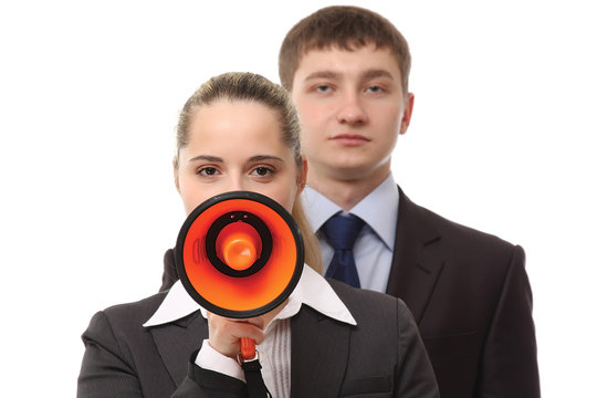 Business people with a loudspeaker