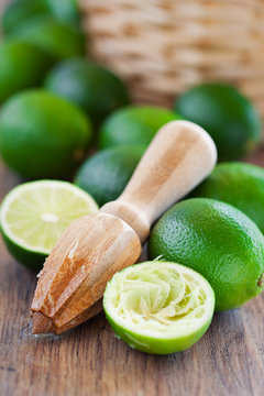 Squeezer and fresh limes