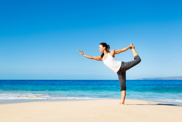 Fototapeta na wymiar Woman Practicing Yoga