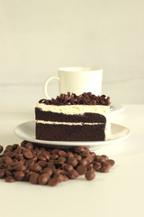 The Chocolate cake a cup of coffee