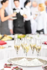 Tuinposter Champagne toast glasses for meeting participants © CandyBox Images
