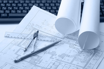 Drawings, compasses, ruler, pencil and the laptop