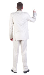 back view of Business man  pointing.