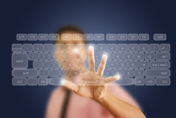 Businessman pushing keyboard on the whiteboard.