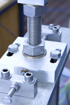 Screw and nut on CNC machined part