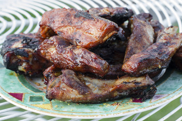 Spare Ribs: BBQ spare ribs marinated in hot and spicy sauce.
