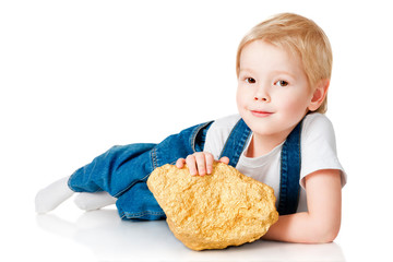 Boy with a gold nuggets, isolated on white