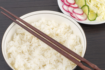 Japanese steamed rice served with salad.