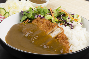 Katsu Kare served with salad, steamed rice and curry sauce.