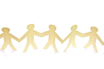 Cutout paper people over white background