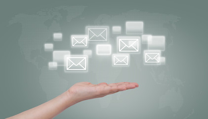 Hand and button on blue sky