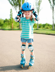 Little girl in roller skates