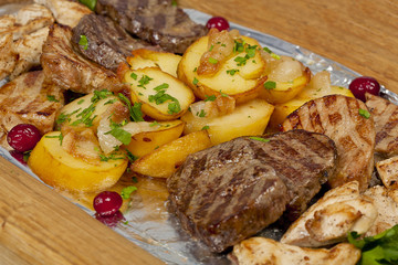 Rustic grilled beef steak with potatoes