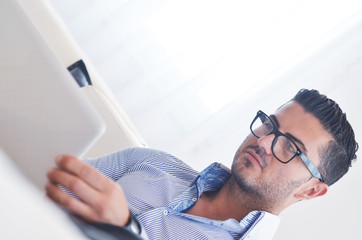 happy young man relax at home with laptop