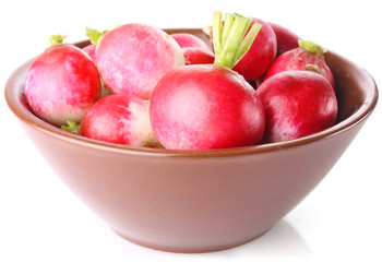 radish in ceramic plate isolated on white background