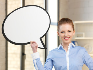 smiling businesswoman with blank text bubble