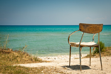 Lonely old chair on beach
