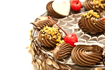 Fototapeta premium Chocolate cake isolated on white background