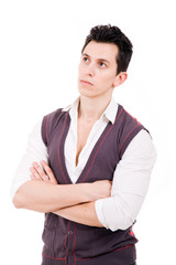 Young man with a pensive expression looking up