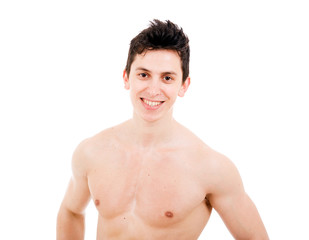 Young happy muscular man isolated on a white background