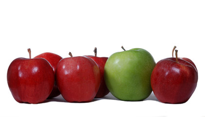 Red apples with one green apple