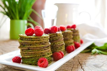 Nettle pancakes with raspberries