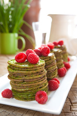 Nettle pancakes with raspberries