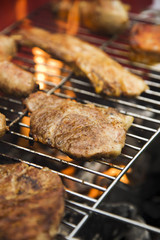 Closeup of fried burgers in fire
