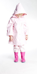 little girl wearing raincoat