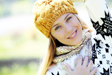 Portrait of blond woman in winter clothes and accessories - obrazy, fototapety, plakaty