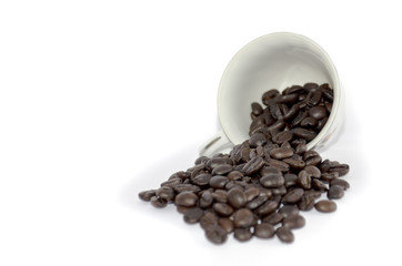 Coffee cup and grain on white background