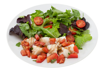 boiled fish with sauce and vegetable salad