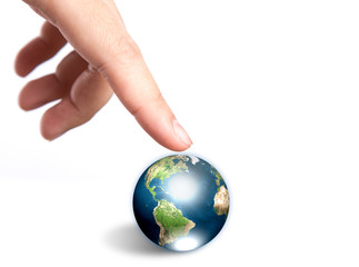 Hand pointing to earth  (Elements of this image furnished by NAS
