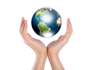 Hands with earth (Elements of this image furnished by NASA)