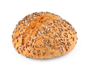 A loaf of homemade bread with sunflower seeds isolated on white