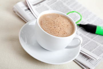 Morning coffee with newspaper