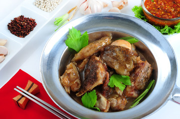 Roasted fish head in clay pot