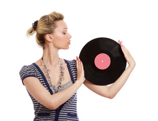 A young woman with a vinyl disc, closeup
