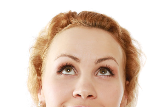 A young woman looking up