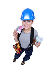 Tradeswoman holding money