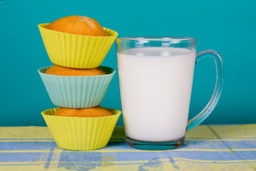 Glass of milk and cupcakes