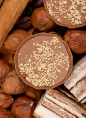 Closeup of coffee beans, cinnamon and nuts