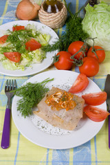 Cabbage rolls and fresh vegetables