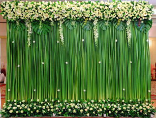 Green backdrop flowers arrangement